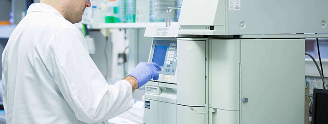 Scientist in Lab Analytical and Microbial Testing with Equipment