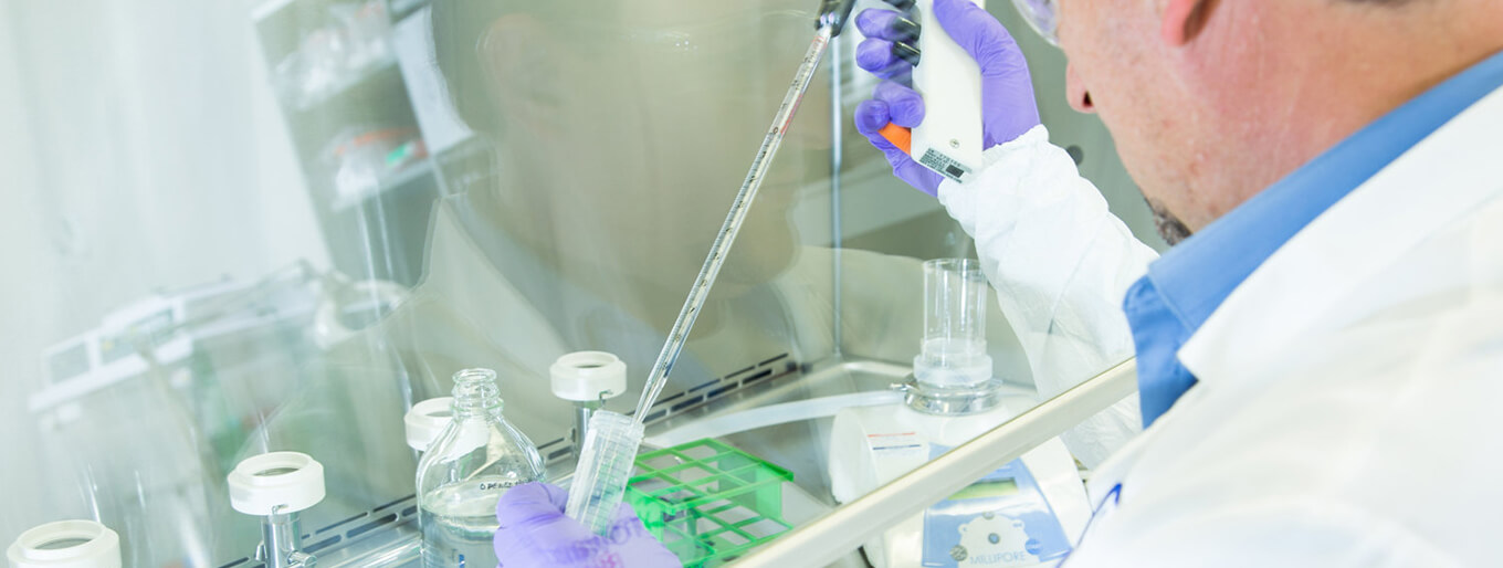 Scientist in Lab Stability Testing with Equipment